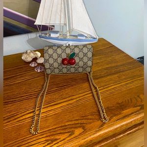 Gucci Supreme GG cherry mini bag